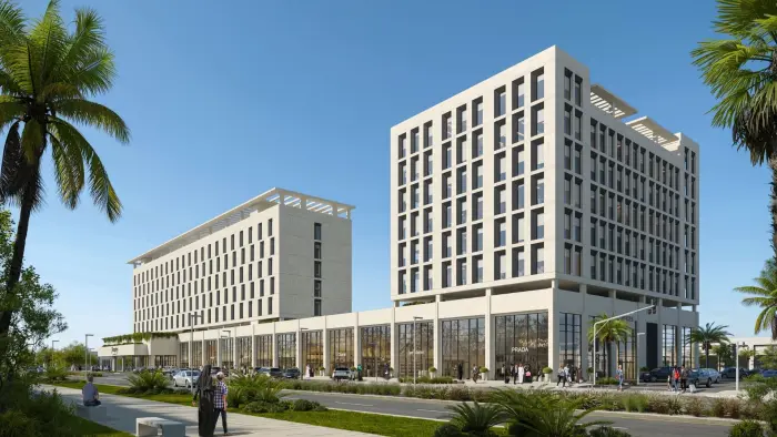 مبنى إداري تجاري حي الجامعة - Manassat Real Estate Company